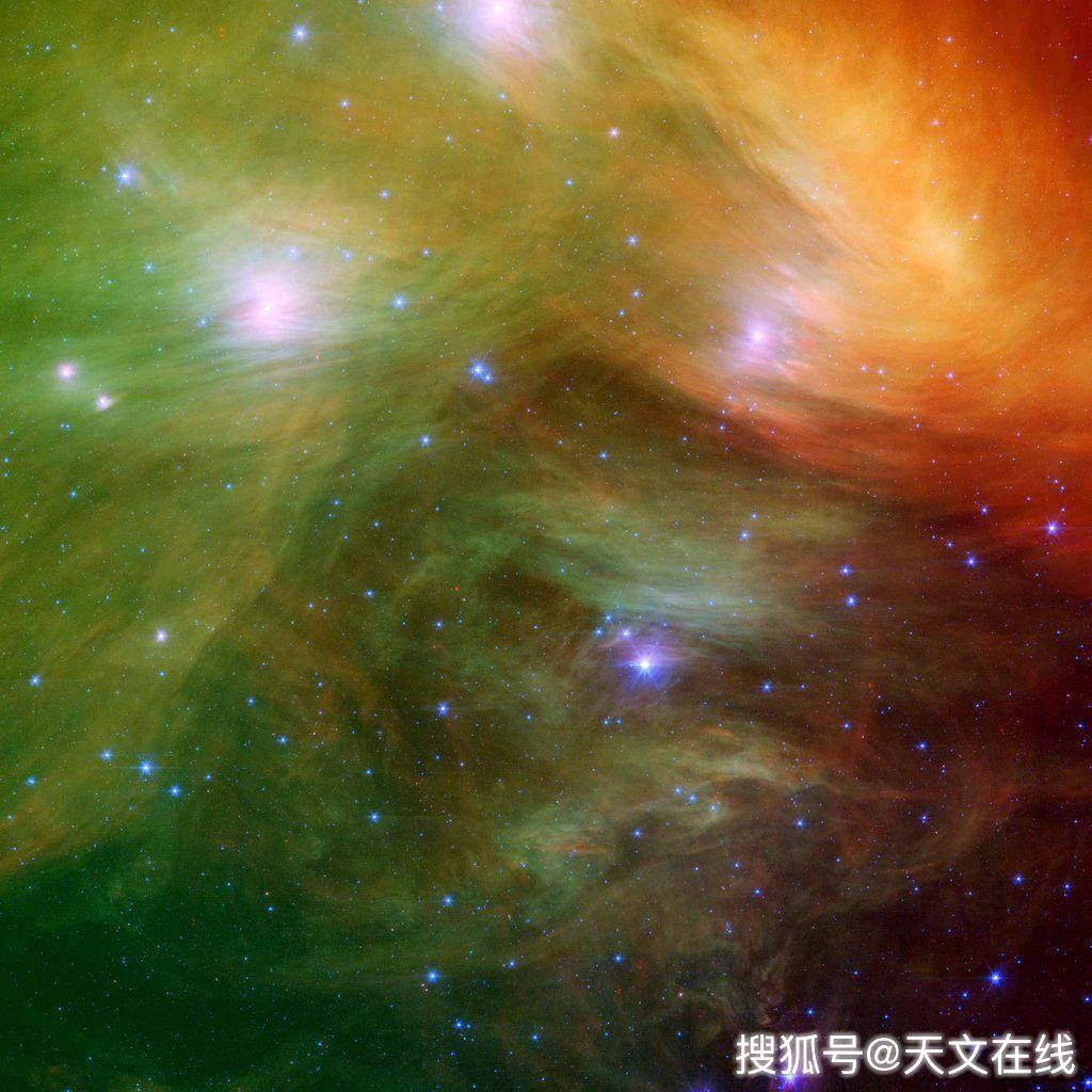 图解:史匹哲太空望远镜以红外线拍摄的昴宿星团,显示出伴随着的尘埃.