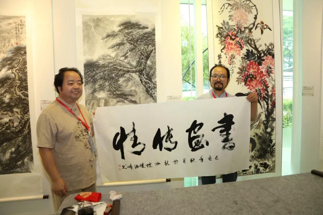 侬海峰受邀参加第六届中新马书画名作品展览报道