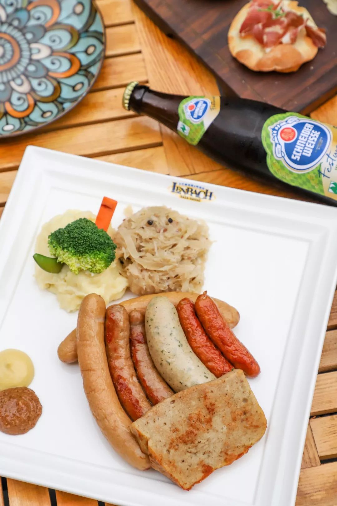 mixed german sausage with mashed potato & sauerkraut