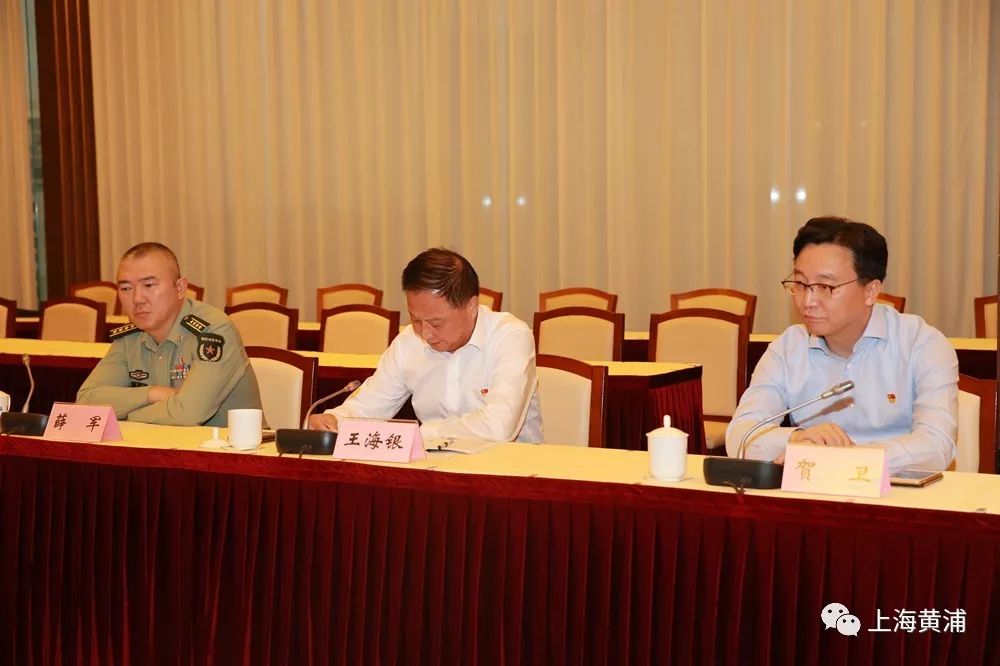 研讨会上,区委常委,统战部长沈权,区人民法院院长,党组书记樊长春,区