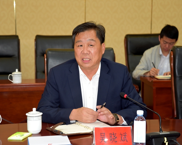 吴晓斌与王喜贵一行座谈_平朔