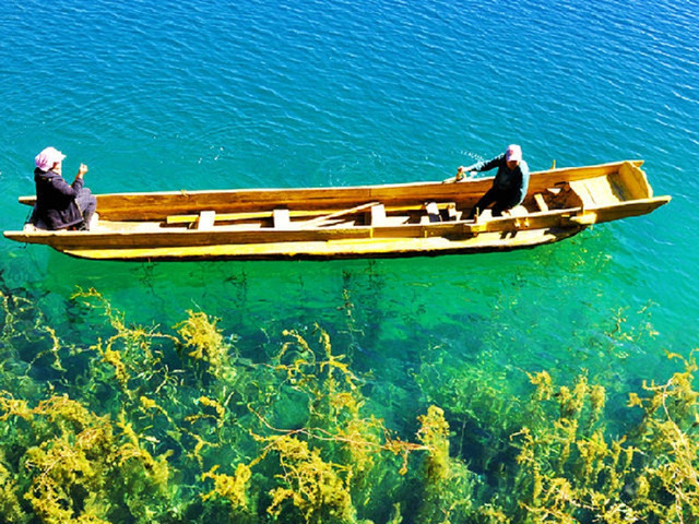 丽江到泸沽湖二日旅游攻略,乘猪槽船游湖,可你知道它的故事么?