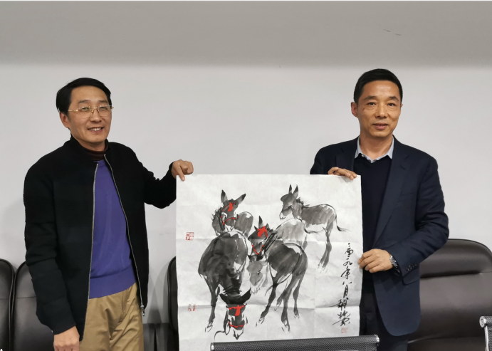 燕京书画社画家赵路先生向慈航集团温总赠送书画作品燕京书画社与