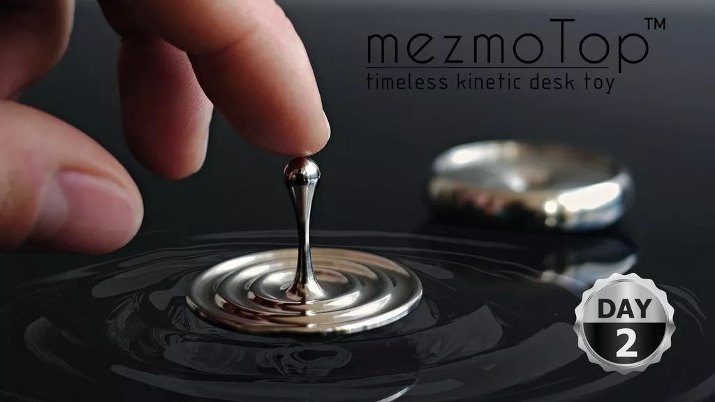 如何用陀螺 冻结水滴坠落的瞬间 桌面