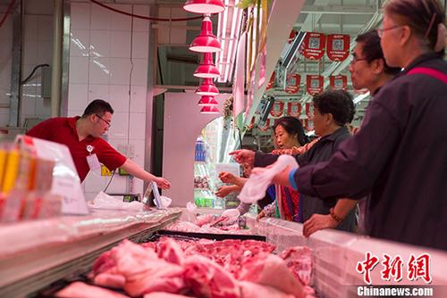 中国猪肉价格止涨回落政策“组合拳”效果渐显