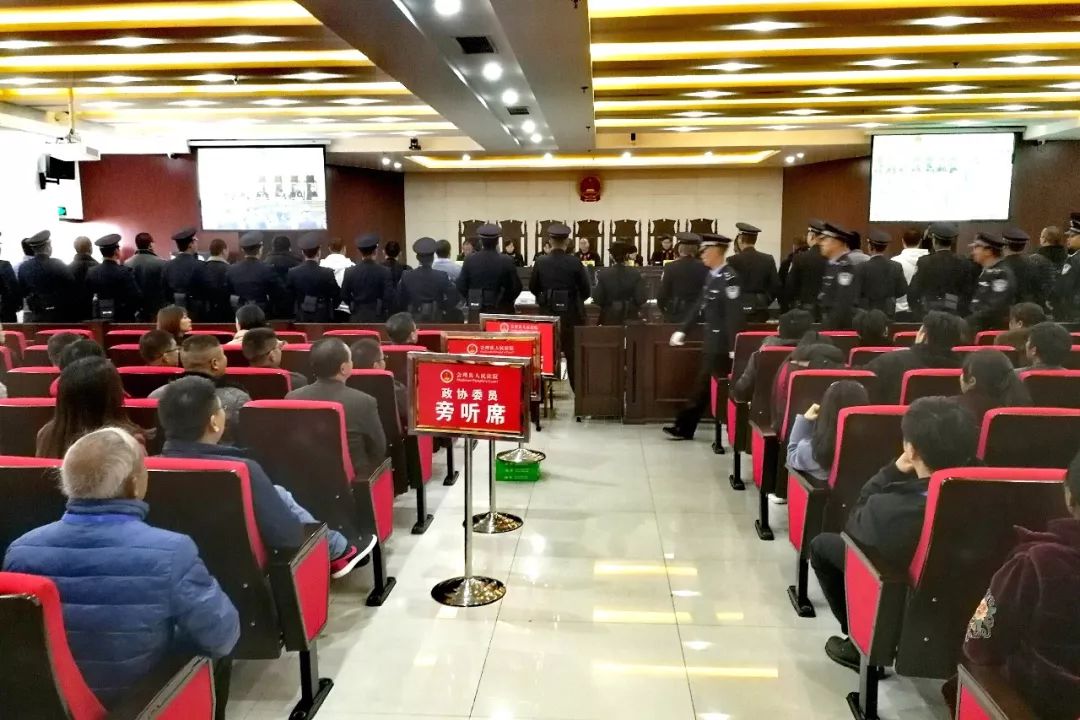 会理县人民法院公开开庭审理罗国彩,唐善会等19名被告