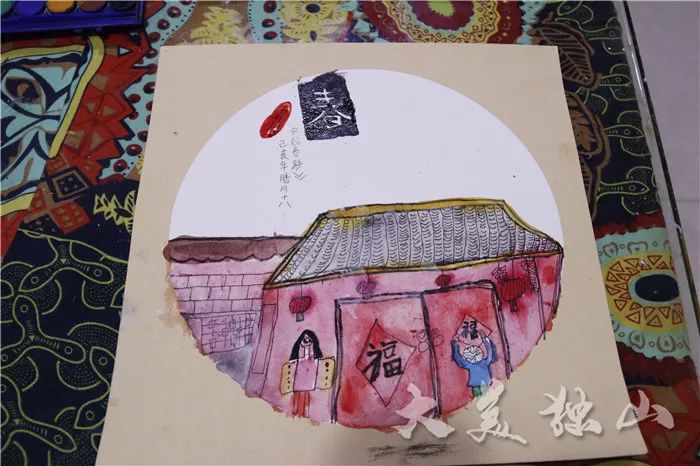 手绘年画唤醒传统春节的记忆