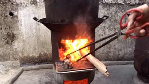 废弃的煤气罐改造成柴火炉,燃烧完全火力猛且烟小
