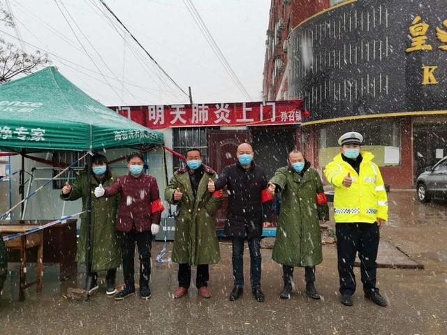 新蔡县孙召镇风雪挡不住战疫路