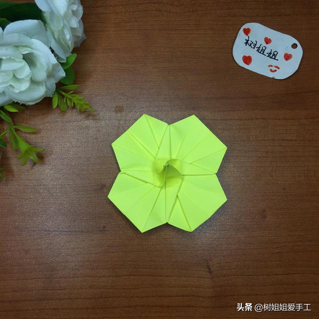 玩具折纸一纸成型的花朵陀螺折法