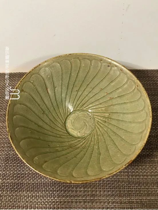 能看出这件耀州窑是真是假么?