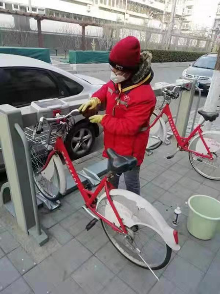 西城加大公共场所防控力度 消毒百万辆共享单车和公租自行车
