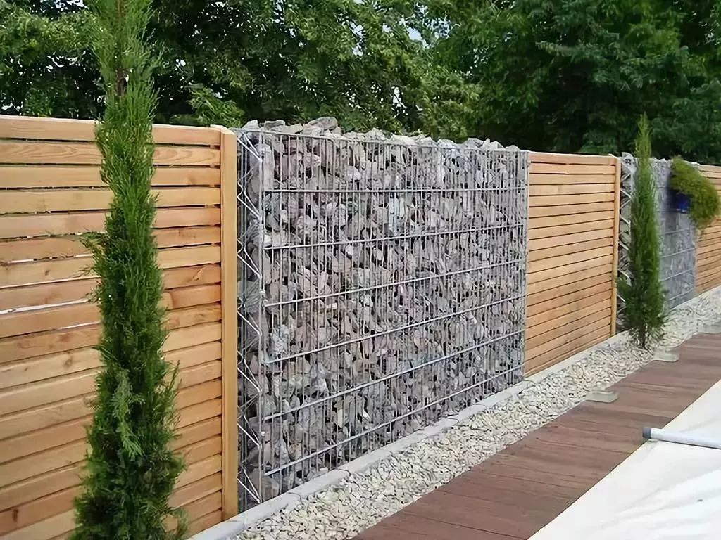 石笼挡墙砖石围墙在选材上,几乎所有重要的建筑材料都可以成为建造