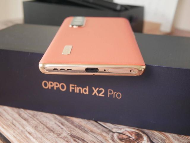 oppofindx2卡槽图解,oppofindx2pro图片 先给大家说说oppo find x2 pro整体的外观设计,其正面采用打孔曲面