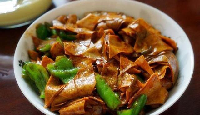 油淋干豆腐的做法最正宗的做法 5e9cb9683cfd4131a69c5eea6ba9715d.jpeg