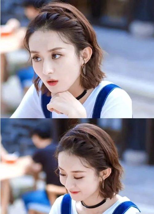 编扎出的公主头紧跟时尚,打造出小美女的时尚风采,而且两侧头发是以