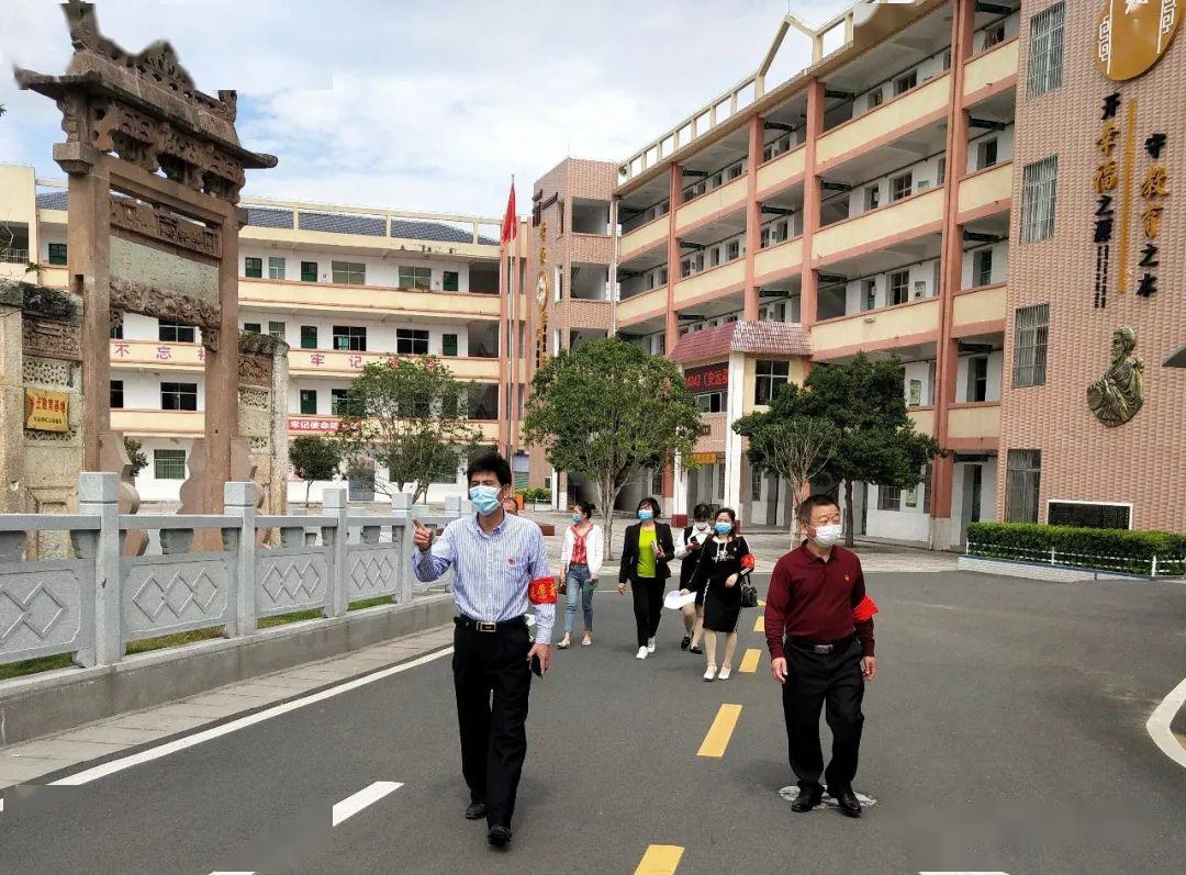 爱心巡逻 筑牢"防火墙"—— 安远县九龙小学党员教师"