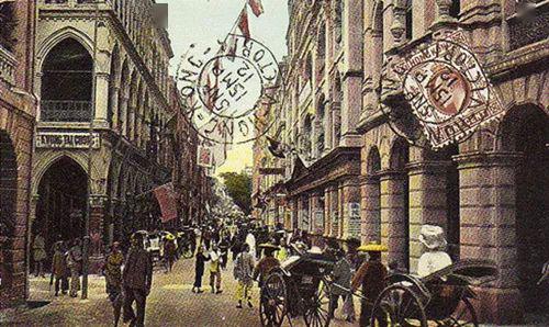 一百年前的香港上色照片,西洋人坐轿子,印度警察耍威风