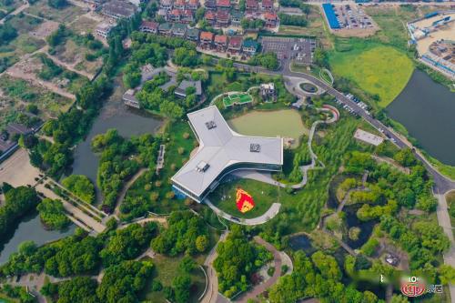 霞客岛生态城:建在轻轨旁的湿地文旅大盘!