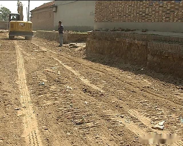丁庄子村把路修到群众心坎上
