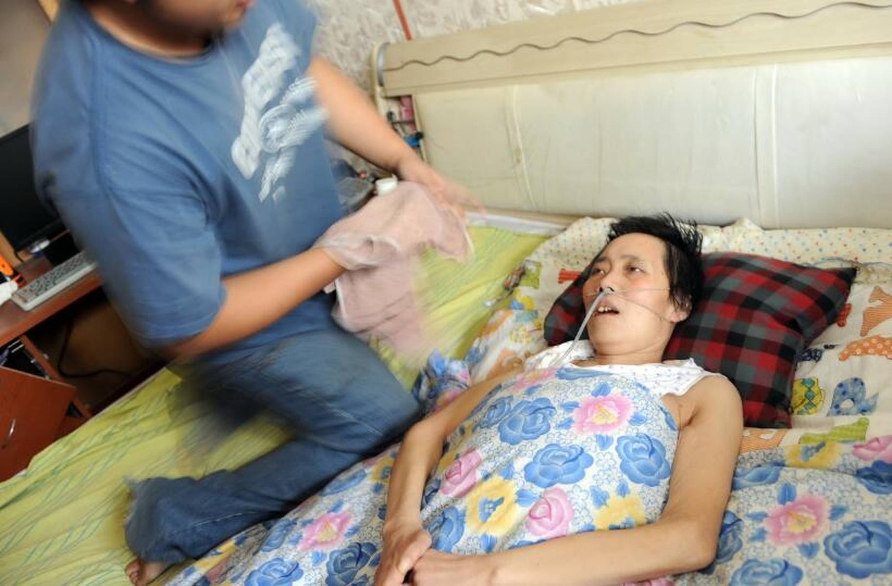 丈夫因妻子成植物人转移全部存款 儿代母告状离婚