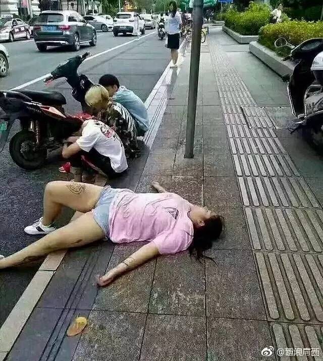 好惨!广西一女子路边装醉等待"捡死鱼,结果三名男子