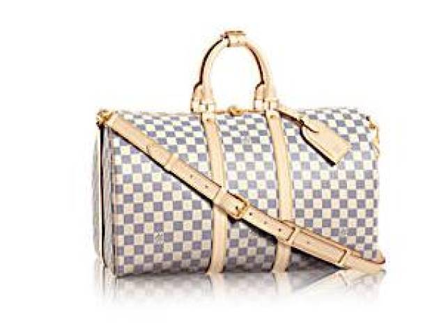 旅行包怎么放东西 17011bdf86674700a2313df4991145e4.jpeg