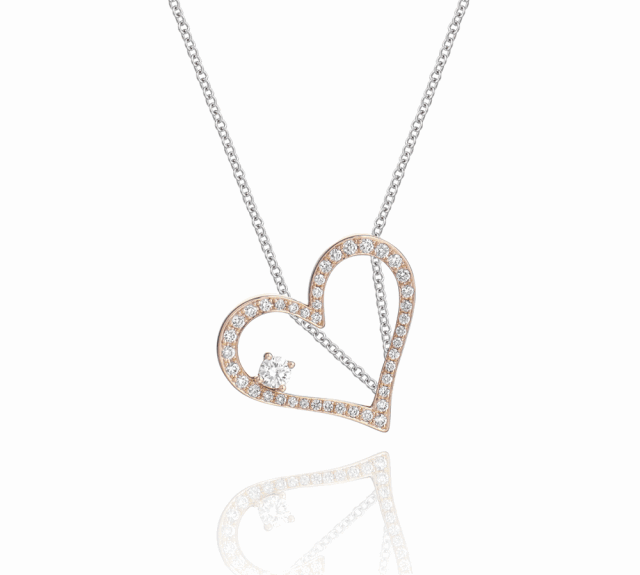 18k玫瑰金打造的心形轮廓仿若心跳图腾穿梭其中,精心设计的心跳图案在