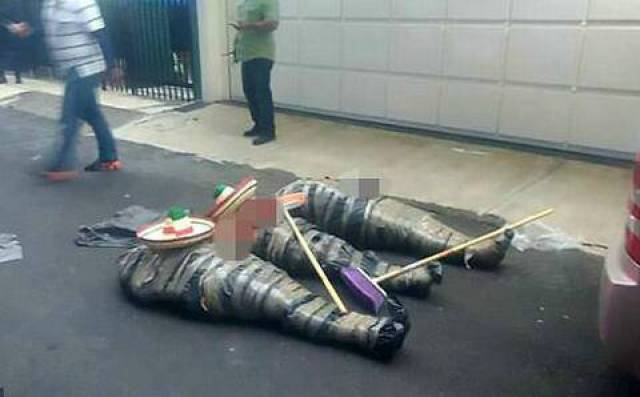 恐怖!墨西哥3男女被绑架斩首 尸体弃街头(组图)_手机