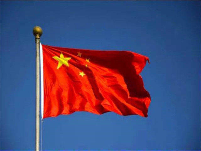 旗上的五颗五角星及其相互联系象征着共产党领导下的中国革命人民