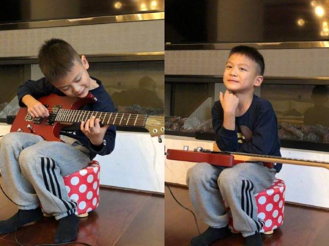 近日他晒出小靓仔弹吉他的照片,并发文:果然每一个男孩心里都住着一个