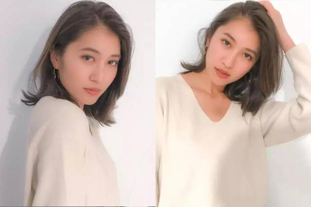 有层次感修剪的齐肩发 慵懒空气感烫卷设计更加性感撩人,发尾略带