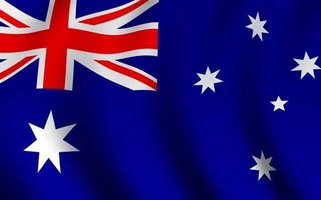 英国国旗,右边是四颗镶白边的红色五角星,代表太平洋上空的南十字星座