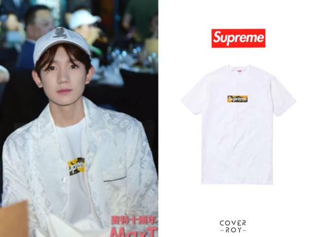 来自supreme的外套及白色t恤衫,vetements 的蓝色牛仔裤,一双香奈儿