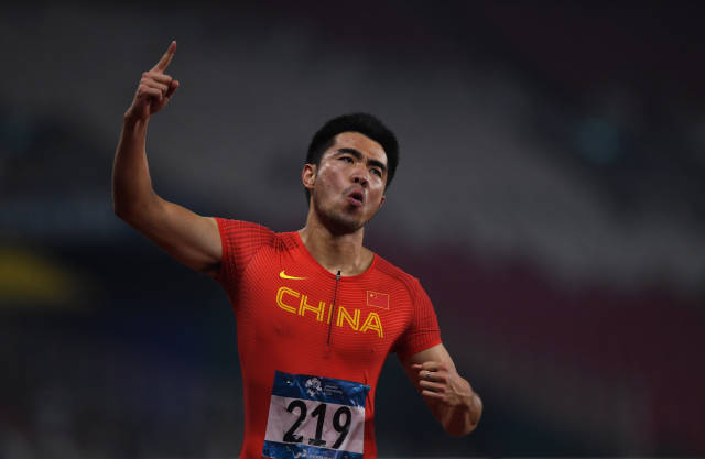 高清图:亚运男子110米栏决赛 谢文骏夺冠卫冕