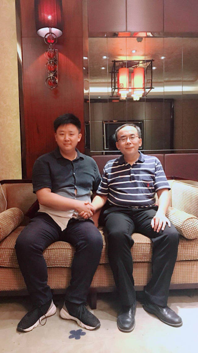 陈科成董事长与执行副总成立功一同会见周申教授