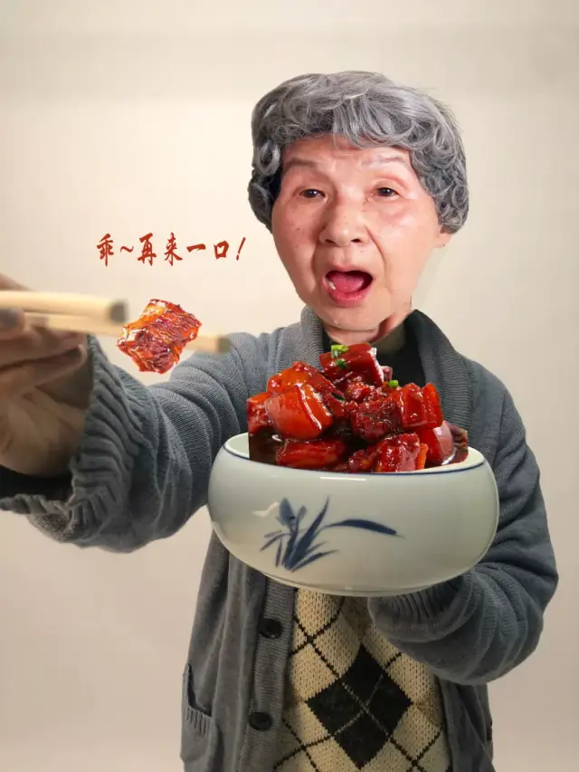 食物,奶奶还在不停地给你夹菜,"奶奶专门给你做的红烧肉,多吃点,张嘴