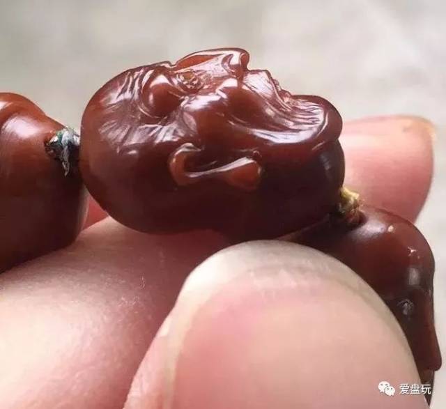 这串橄榄核盘透了包浆 难不成是假货?