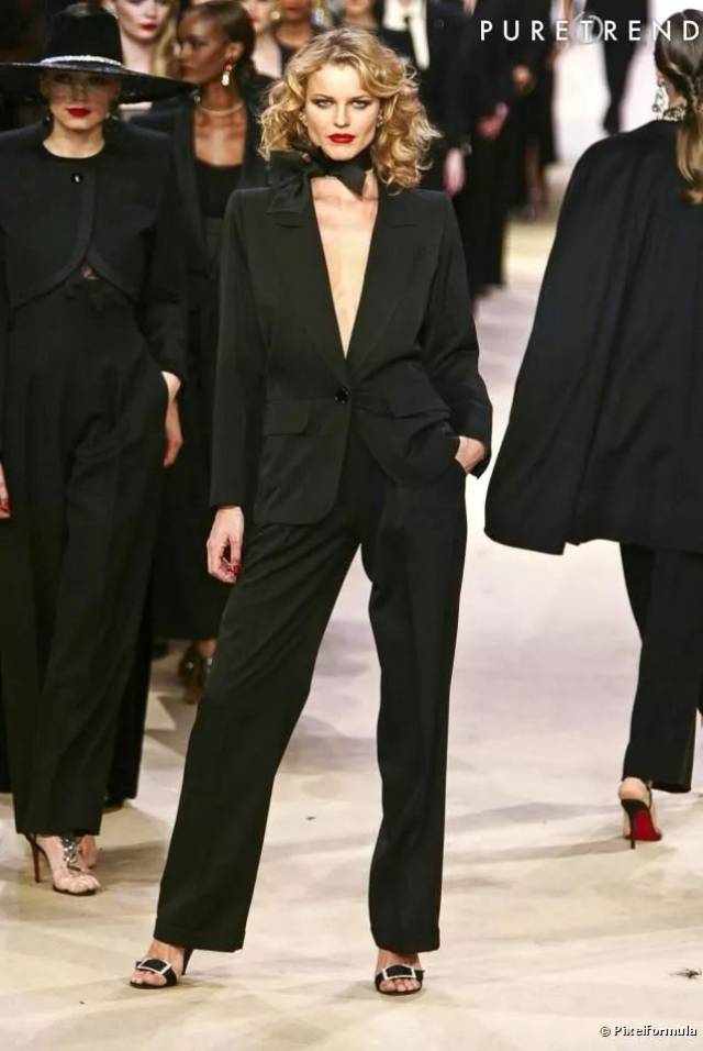 "le smoking suit" worn by eva herzigovain at the ysl 2002 finale