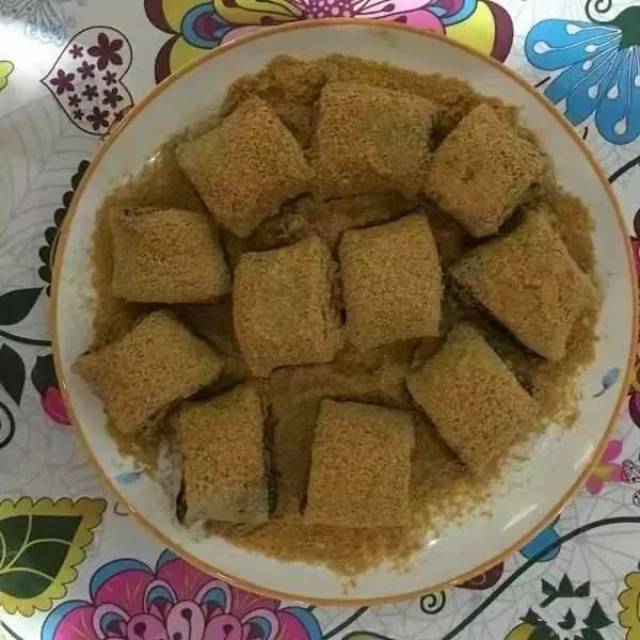 (糯米饭小吃驴打滚,万合叫麻子米果)