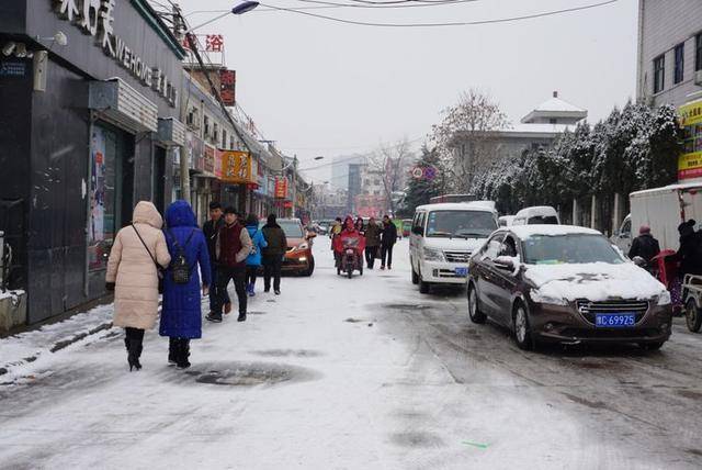 洛阳雪中行走关林街道,洛钢路上体验人文民俗