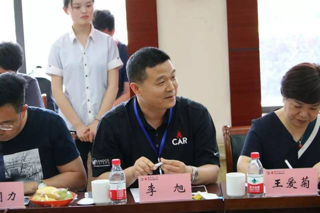 伍佰会总经理赵静,河南爱马乐贸易有限公司董事长李旭,河南国达企业