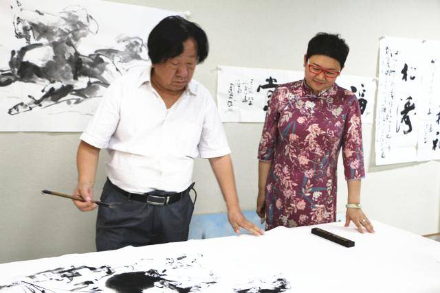 书画名家潘建业的艺术足迹_手机搜狐网
