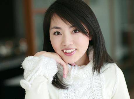 "气象小姐"杨丹,央视主持24年冻龄不老,与大学初恋隐婚生子
