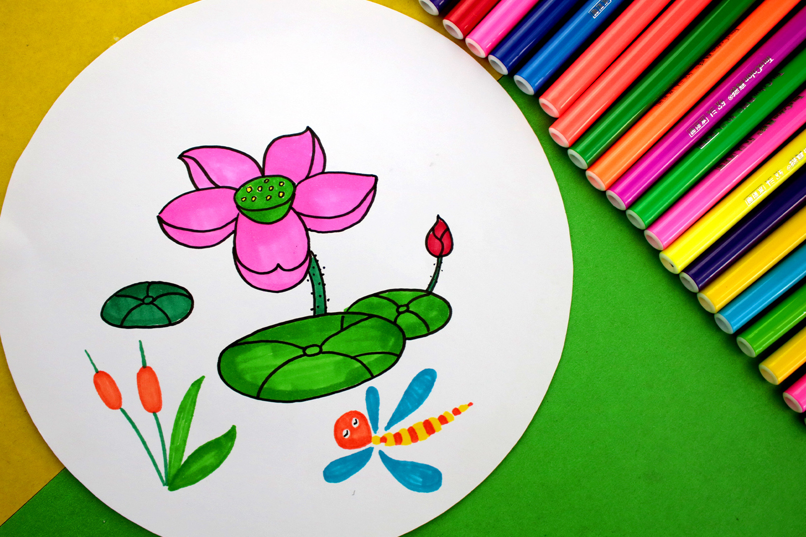 读着优美的儿歌学画夏天的荷花简笔画