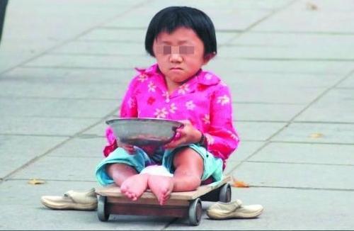 残疾小孩乞丐图片图片