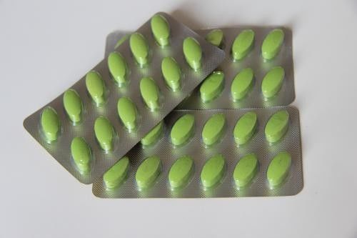 绿色圆形药片的壮阳药图片