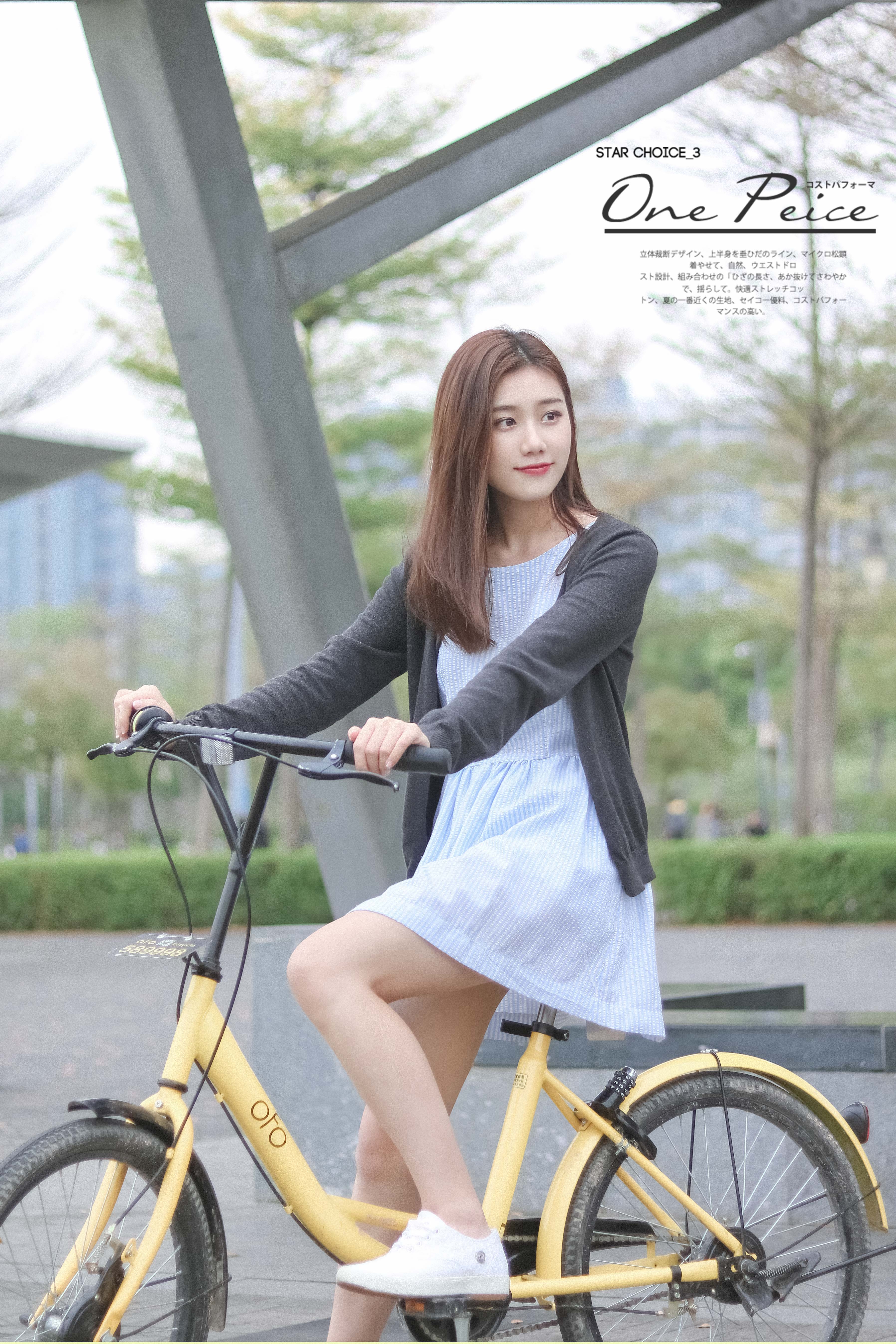 骑共享单车的美女图片