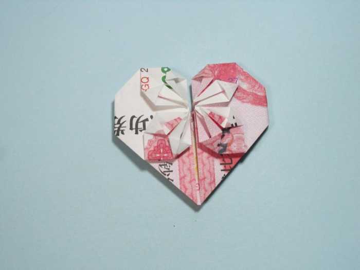 用人民币折纸爱心详细图解 放在钱包里的爱心