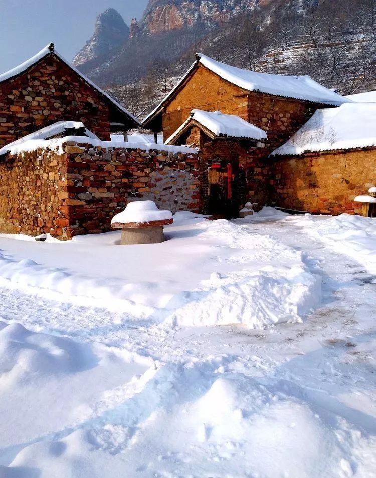 偃师温雪景与释永旭图片